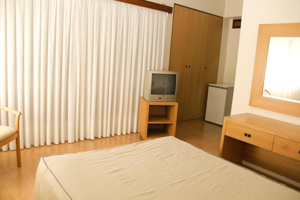 Hotel Chale Paredes Habitación foto