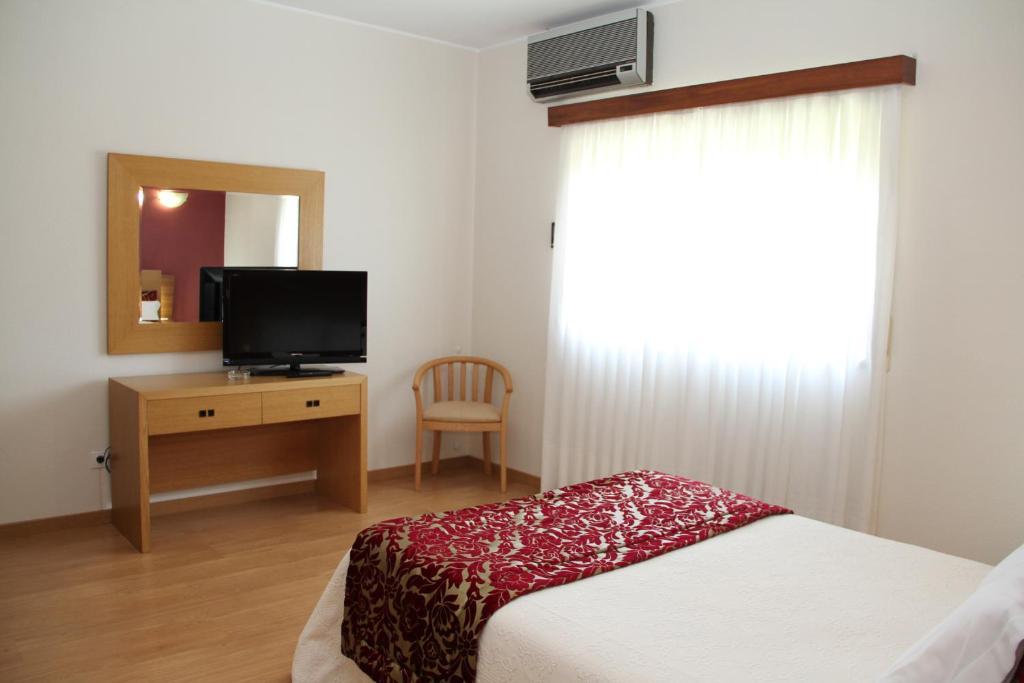 Hotel Chale Paredes Habitación foto